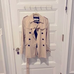 Light pink trench coat from coach! XS. Only been used once!
